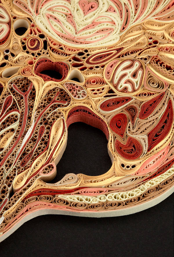 Each piece of tissue is quilled to create a unique pattern.