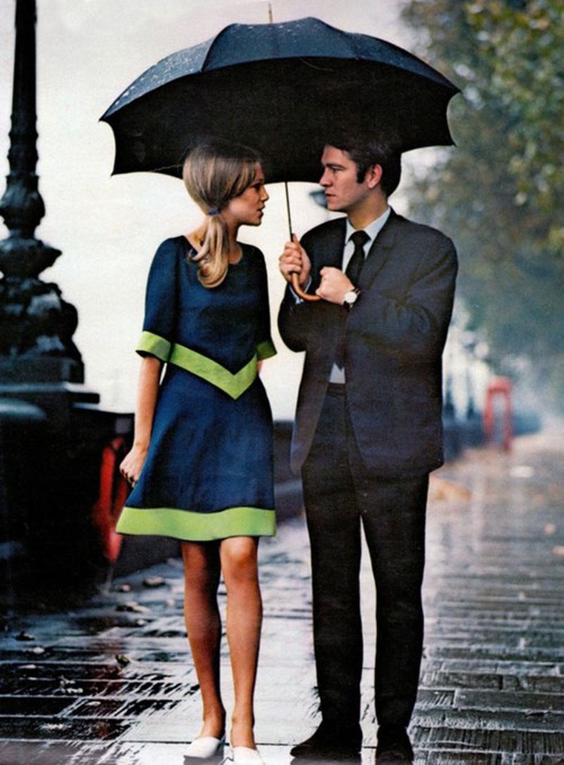 A stylish couple in the rain in London (1963).