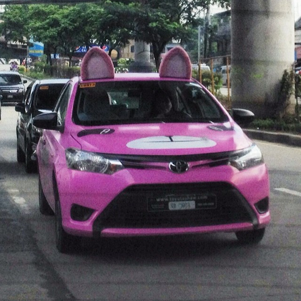 5. If you're feeling more feline, you can hail this fluffy pink GrabTaxi.