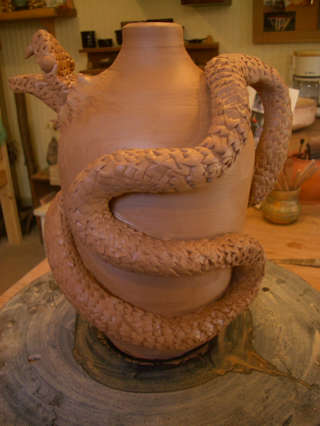 15.) Snake in a Clay Pot