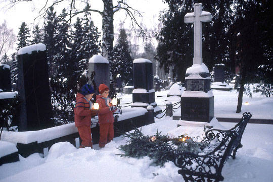 The Finnish people spend part of their Christmas Eve placing candles around the graves of their loved ones.