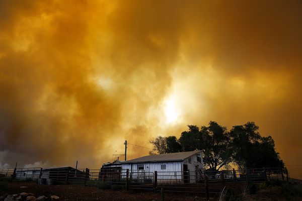 23.) This barn in Colorado sits in the path of a wildfire's destruction.