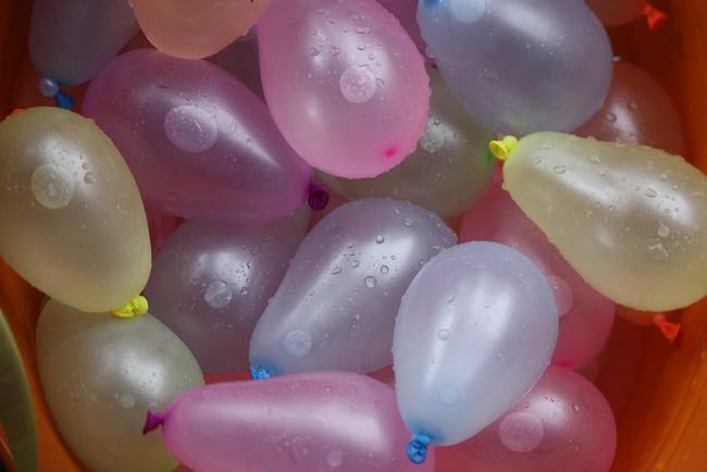 1.) Freeze water balloons and throw 'em in a tub with the drinks to keep them cool without worrying about dirty water.
