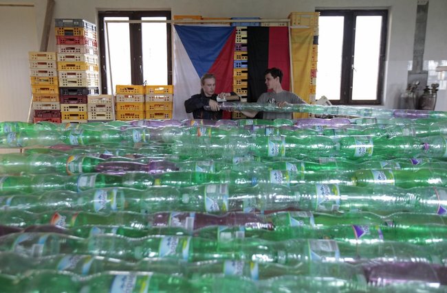 The first step was to attach the bottles to each other. Before that though, Bures and Kara filled them with dry ice. This was done to give them extra buoyancy.