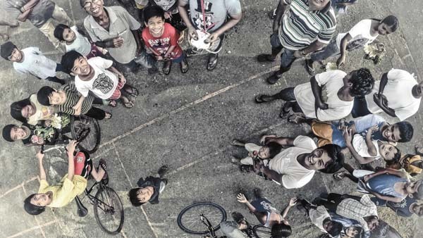 2.) A group of friends looking upwards (Manilla, Philippines).