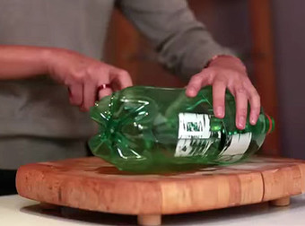 She Cut An Old Soda Bottle In Half And The Reason Why Is Simply Genius