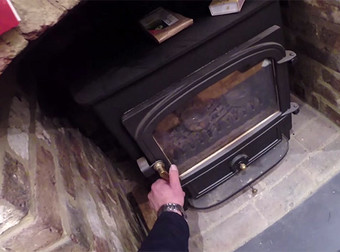 Squirrel Stuck In A Wood Burner Gets Saved Right Before Being A Flaming Furball