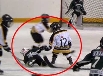 Little Hockey Player Falls, But Gets Help From Player On Opposing Team