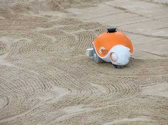 You Won’t Believe What This Awesome Robot Is Doing On A Sandy Beach