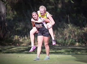 Teen Runner Stopped To Help an Injured Competitor. And Then She Carried Her.