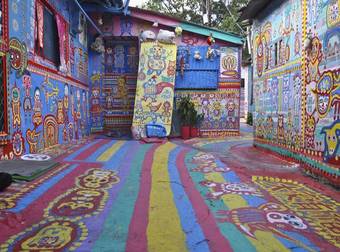 This Rainbow Painted Town Looks Like It Belongs In A Fairytale