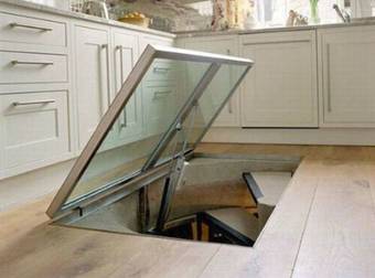 Only The Coolest People Have Modern Wine Cellars Hidden In their Kitchen Floors