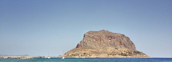 This Rocky, Greek Island Looks Abandoned, But It’s Hiding A Secret City