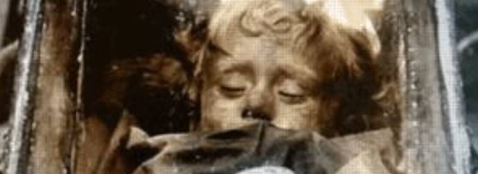 Is This An Optical Illusion, Or Is This Mummy Opening Her Eyes?