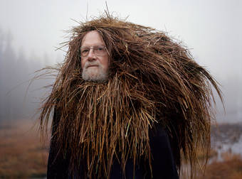 In Finland, Elderly People Are Being Covered In Sticks And Dirt. For Art?