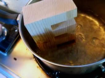 After Boiling A Block Of Wood, This Guy Pulls Off The Almost Impossible